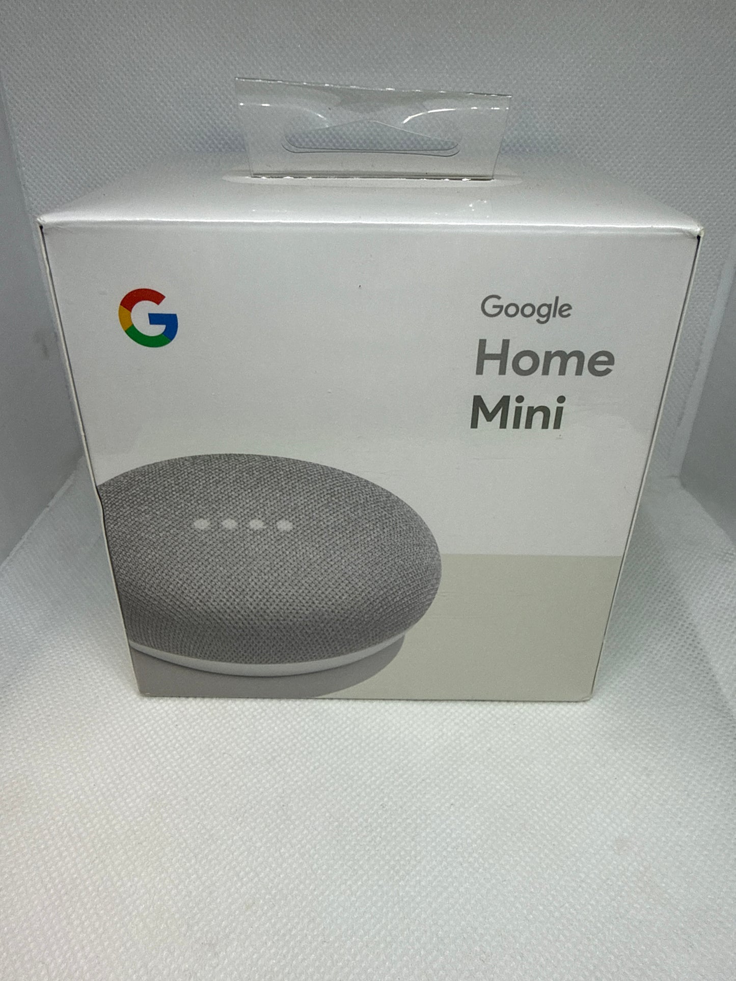 Google Home Mini Smart Speaker in the Chalk - light gray - 1st Generation - Used - Unopened